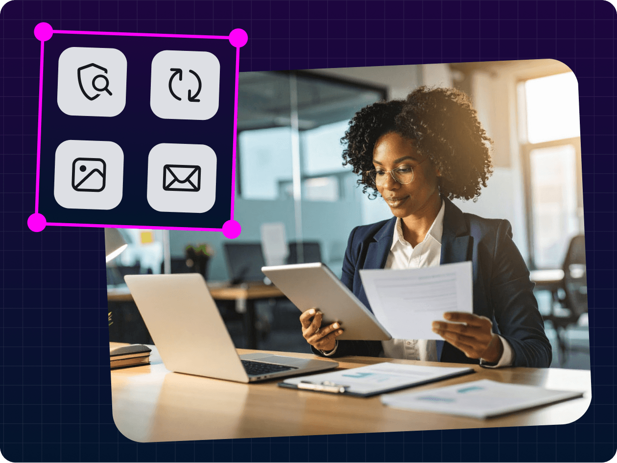 Professional reviewing designs on a tablet with Canva brand tools overlay